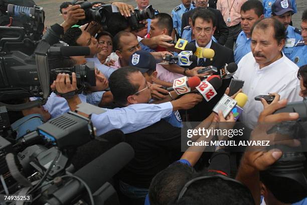 Nicaragua's President Daniel Ortega , talks to the press before boarding the Mexican Air Force lear Jet of the Mexico Presidency, 27 June 2007, in...