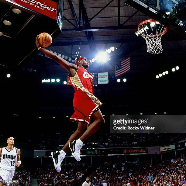 LeBron James of the Cleveland Cavaliers soars for a dunk during a 2004 NBA game against the Sacramento Kings at the ARCO Arena in Sacramento,...