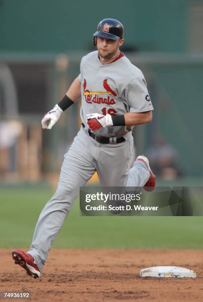 Chris Duncan of the St. Louis Cardinals rounds second base against the Kansas City Royals at Kauffman Stadium in Kansas City, Missouri on June 14,...