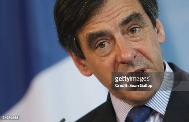 French Prime Minister Francois Fillon speaks to the media after talks with German Chancellor Angela Merkel at the Chancellery June 28, 2007 in...