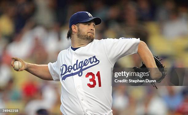 Brad Penny of the Los Angeles Dodgers delivers the pitch against the New York Mets at Dodger Stadium June 13, 2007 in Los Angeles, California.