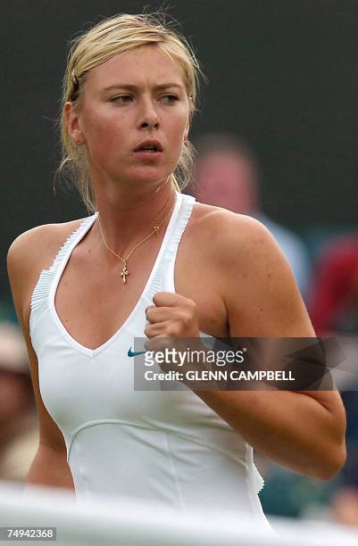 London, UNITED KINGDOM: Maria Sharapova of Russia gestures during her match against Severine Bremond of France during the second round of the...