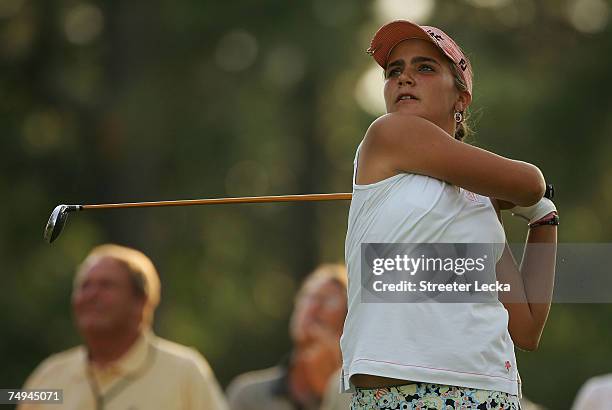 Alexis Thompson watches her tee shot on the 13th hole during round one of the U.S. Women's Open Championship at Pine Needles Lodge & Golf Club on...