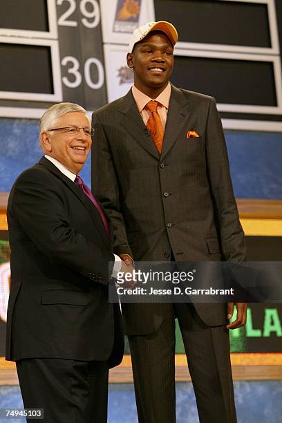 Kevin Durant shakes hands with NBA Commissioner David Stern after being selected second by the Seattle SuperSonics during the 2007 NBA Draft at the...