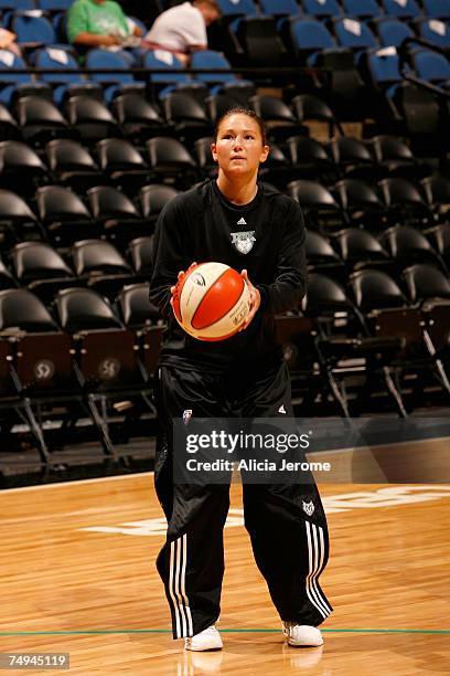 Amber Jacobs of the Minnesota Lynx shoots during warmups before the WNBA game against the Connecticut Sun on June 13 , 2007 at Target Center in...