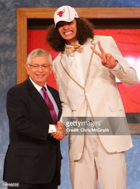 Commissioner David Stern poses for a photo with Joakim Noah of Florida after he was drafted ninth by the Chicago Bulls during the 2007 NBA Draft at...