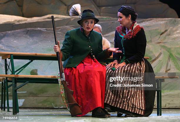 Countess Gloria von Thurn und Taxis and singer Anjara Bartz perform on stage during the rehearsal of the operetta "Weisses Roessl" prior to the Thurn...