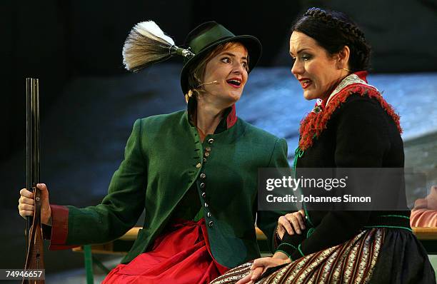 Countess Gloria von Thurn und Taxis and singer Anjara Bartz perform on stage during the rehearsal of the operetta "Weisses Roessl" prior to the Thurn...