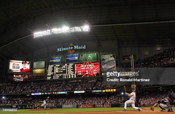Second baseman Craig Biggio of the Houston Astros gets his 3,000th career hit against the Colorado Rockies in the 7th inning on June 28, 2007 at...