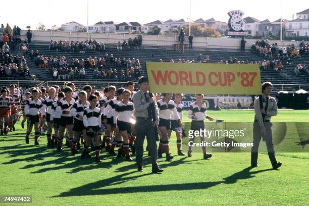 Scouts carry a "World Cup '87" banner during the 1987 Rugby World Cup Opening Ceremony at Eden Park on May 22, 1987 in Auckland, New Zealand.