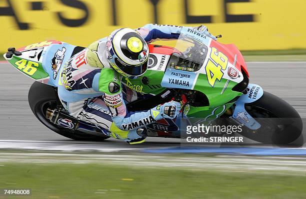 Italian rider Valentino Rossi rides his Yamaha 28 June 2007 during a free practice session ahead of the 30 June 2007 Dutch Moto Grand Prix in Assen....