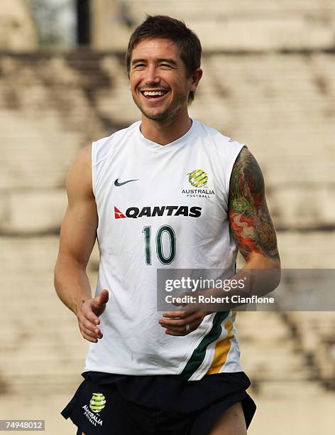 Harry Kewell of Australia is seen in a jovial mood during the Australian Socceroos training session at Singapore National Stadium on June 29, 2007 in...