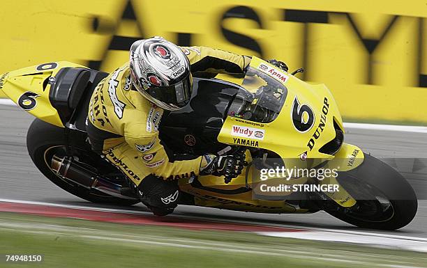 Japanese Makoto Tamada rides his Yamaha 28 June 2007 during a free practice session ahead of the 30 June 2007 Dutch Moto Grand Prix in Assen....