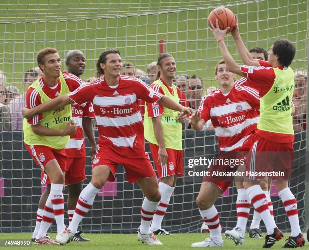 Valerien Ismael, Christian Saba, Daniel van Buyten, Martin Demicheis, Miroslav Klose and Jos? Ernesto Sosa play a game of basketball during the...