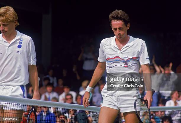 Defending champion Boris Becker of West Germany and unseeded Australian tennis player Peter Doohan during their second-round match in the...