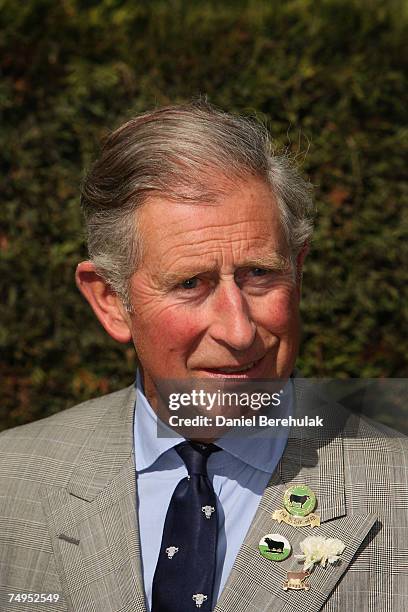 Prince Charles, Prince of Wales speaks with local residents during a visit to flood effected areas on June 29, 2007 in Catcliffe near Sheffield,...