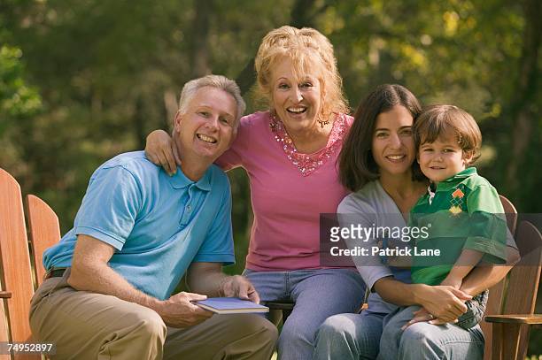 happy family - adirondack chair closeup stock pictures, royalty-free photos & images