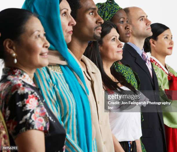 multi-ethnic people in traditional dress - different nationalities stock-fotos und bilder