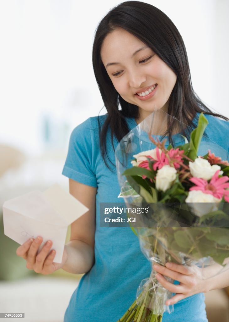 Asian woman receiving flowers