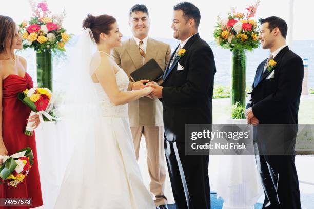 multi-ethnic couple getting married - wedding vows stock pictures, royalty-free photos & images