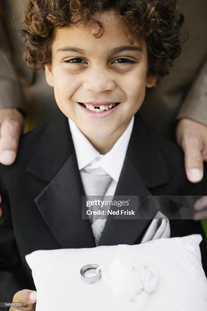 Boy as ring bearer at wedding