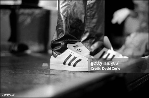 Close up of Adidas Superstar shoes at a Run-DMC's concert at Hammersmith Odeon London, UK, 13 September 1986.