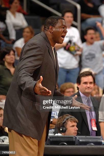 Wayne "Tree" Rollins, head coach of the Washington Mystics, agrues a call in a WNBA game against the Detroit Shock on June 29, 2007 at the Verizon...