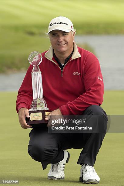 Stephen Dodd of Wales holds the championship trophy after winning the 2006 Smurfit Kappa European Open at the K Club in Straffan, Ireland on July 9,...