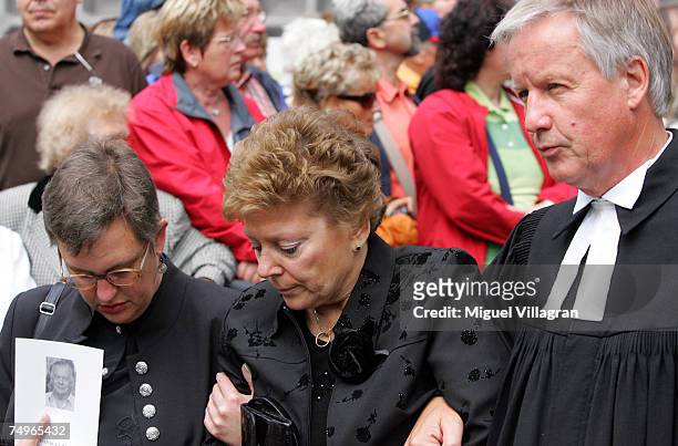 Wussow's widow Sabine Wussow and priest Juergen Fliege leave the church after the funeral service for late German actor Klausjuergen Wussow at the...