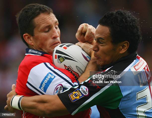 Zeb Luisi of Harlequins RL and Mark O'Neill of Hull KR come together during the Engage Super League match between Harlequins and Hull FC at the...