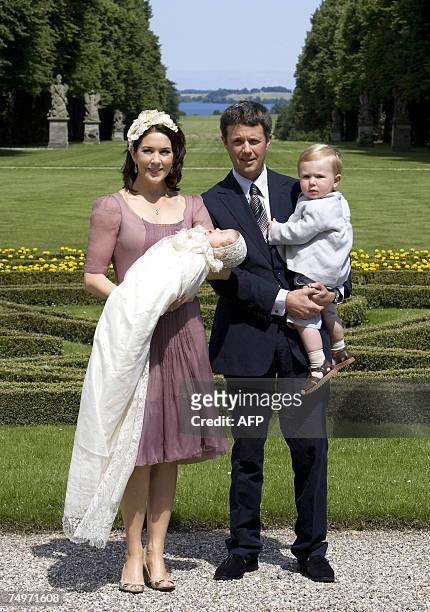 Danish Crown Princess Mary and Crown Prince Frederik hold two-month-old daughter, Isabella Henrietta Ingrid Margrethe and 18 month-old Prince...