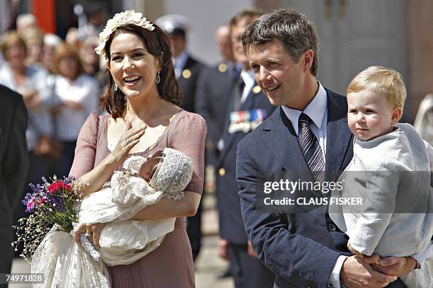 Danish Crown Princess Mary and Crown Prince Frederik hold their two-month-old daughter, Isabella Henrietta Ingrid Margrethe and 18 month-old Prince...