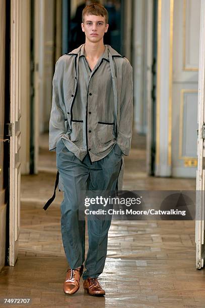 Model walks the catwalk during the Lanvin fashion show as part of Spring Summer 2008 Paris Menswear fashion week on July 1, 2007 in Paris, France.