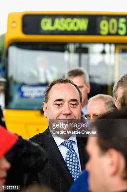 Scotland's First Minister, Alex Salmond, speaks to a passenger at Glasgow Airport, July 1 2007 in Glasgow, Scotland. Salmond spoke to the emergency...