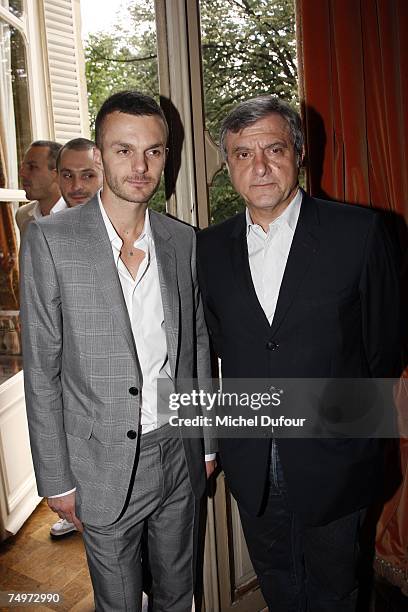 After Heidi Slimane,new designer Chris Von Asch,posing with Sidney Toledano at the Dior Fashion show, during Paris Menswear Fashion Week...