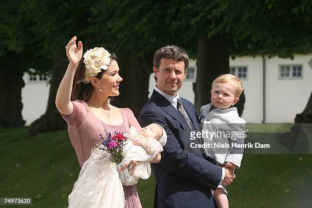 Princess Mary of Denmark holding her baby daughter Princess Isabella of Denmark, Prince Frederik of Denmark and Prince Christian of Denmark of the...