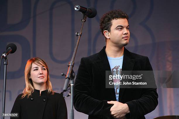 Singer Guy Sebastian and girlfriend Julie Egan perform at the event marking the Sydney arrival of The World Youth Day Cross and Icon, at Tumbalong...