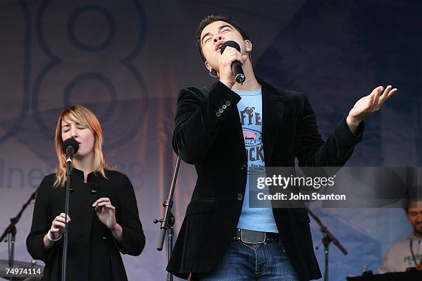 Singer Guy Sebastian and girlfriend Julie Egan perform at the event marking the Sydney arrival of The World Youth Day Cross and Icon, at Tumbalong...