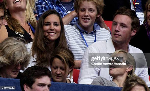 Kate Middleton and Zara Phillips watch the Concert for Diana at Wembley Stadium on July 1, 2007 in London, England.