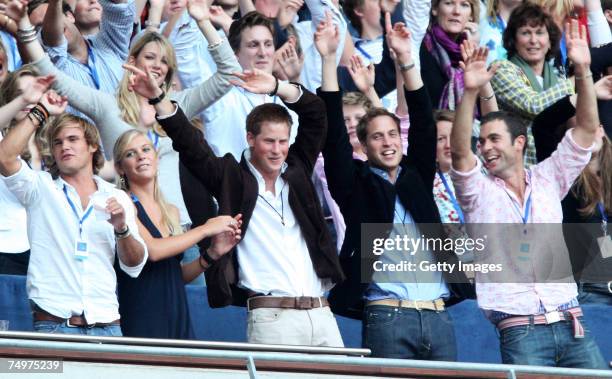 Their Royal Highnesses Prince William and Prince Harry and guest Chelsy Davy watch Rod Stewart perform during the Concert for Diana at Wembley...