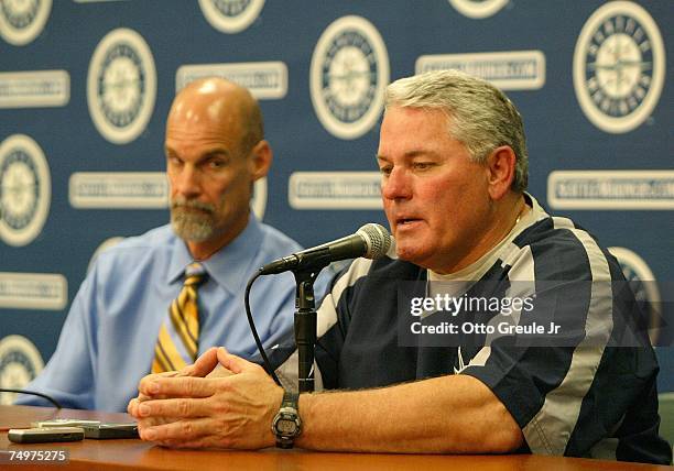 Manager Mike Hargrove of the Seattle Mariners announces his resignation as General Manager Bill Bavasi looks on prior to a game against the Toronto...