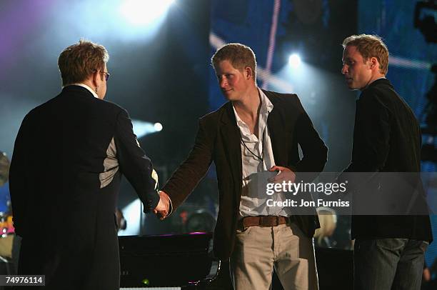 Sir Elton John, HRH Prince Harry and HRH Prince William on stage during The Concert For Diana held at Wembley Stadium on July 1, 2007 in London. The...