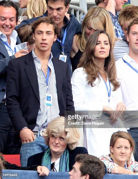 Kate Middleton and a friend watch the Concert for Diana at Wembley Stadium on July 1, 2007 in London, England. The Concert falls on the date that...