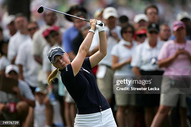 Morgan Pressel hits a tee shot on the 13th hole during the final round of the U.S. Women's Open Championship at Pine Needles Lodge & Golf Club on...