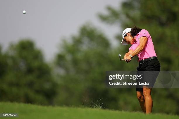 Lorena Ochoa of Mexico hits her second shot from the fairway on the 12th hole during the final round of the U.S. Women's Open Championship at Pine...