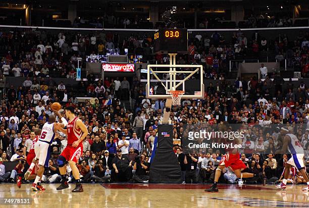 Cuttino Mobley of the Los Angeles Clippers is fouled by Yao Ming of the Houston Rockets on a shot with three seconds left during 92-87 loss in NBA...