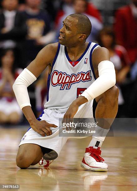 Cuttino Mobley of the Los Angeles Clippers sits on the floor djectedly during the fourth quarter of 92-87 loss to the Houston Rockets iin NBA game at...