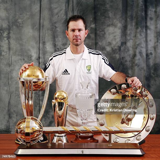 Australian captain Ricky Ponting poses with the 2007 ICC Cricket World Cup trophy, the 2007 ICC Champions Trophy, The Ashes Trophy, the ICC One Day...