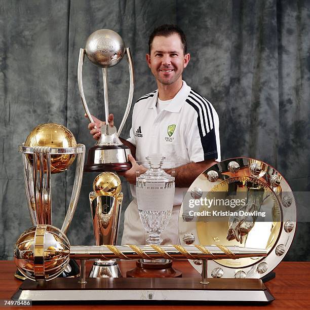 Australian captain Ricky Ponting poses with the 2007 ICC Cricket World Cup trophy, the 2007 ICC Champions Trophy, The Ashes Trophy, the ICC One Day...