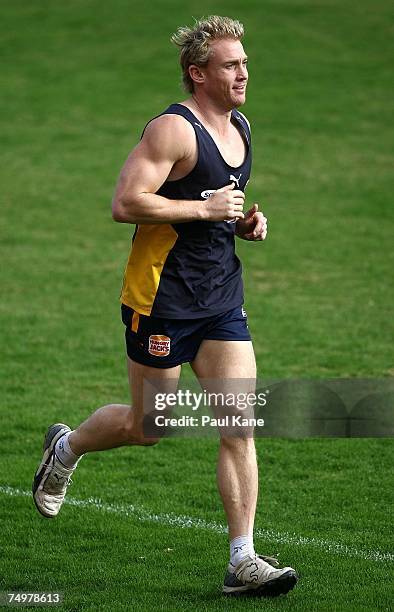 Michael Braun of the Eagles runs laps during a West Coast Eagles AFL training session held at Subiaco Oval July 2, 2007 in Perth, Australia.
